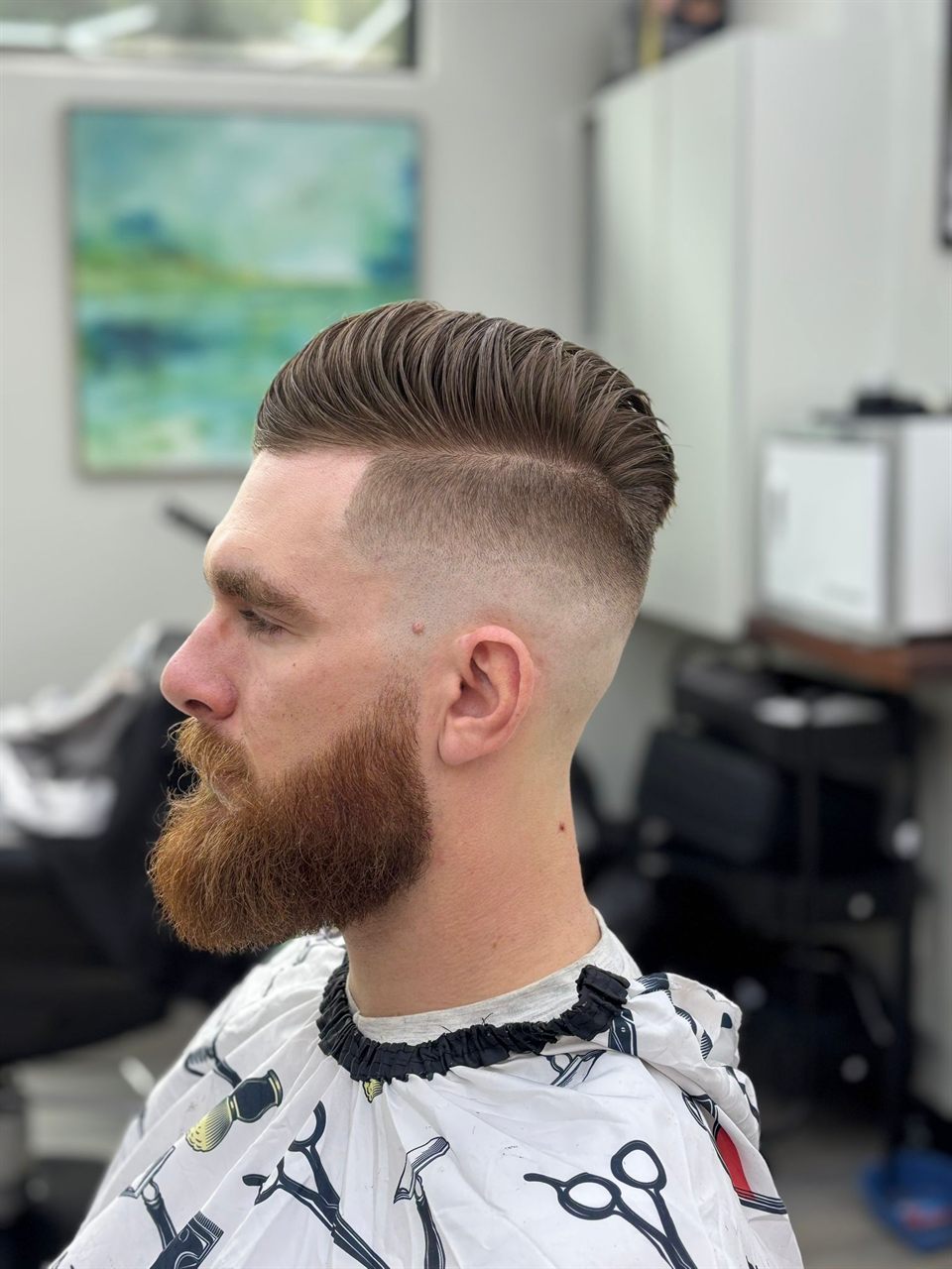 High skin fade with a beard lineup at Royal Look Barber Shop in Broadmead Village, Saanich