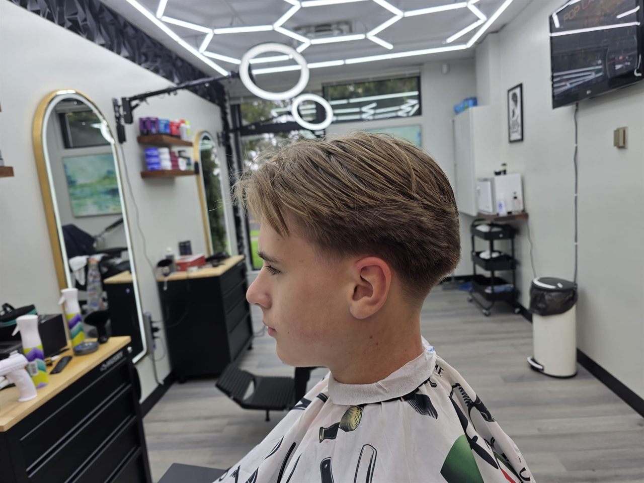 Classic men's haircut at Royal Look Barber Shop in Broadmead Village, Victoria BC